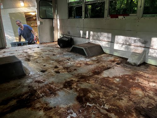 removing the seats out of the old school bus